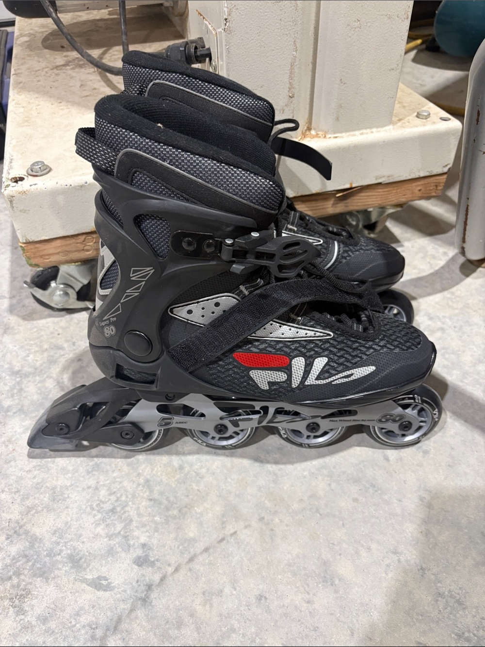 Fila adult men’s size 10 Black and Gray Inline Skates with Red Logo Accent